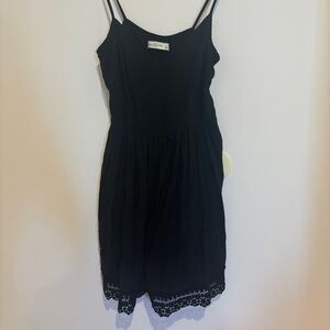 Black Sleeveless Dress with Lace Hem